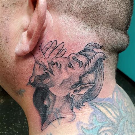 angel whispering in ear neck tattoo|18+ Angel And Devil Whispering In Ear Tattoo Ideas in 2024